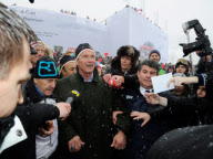 ARNOLD SCHWARZENEGGER watching the world famous Hahnenkamm ski race in Kitzbuhel