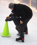 Liev Schreiber Teaching his Son How to Ice Skate at an Outdoor Rink