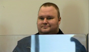MegaUpload.com executives in court to face charges of internet piracy and money laundering, New Zealand - 20 Jan 2012