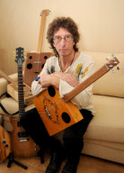 Man creates guitars out of everyday objects and materials, Cannock, Staffordshire, Britain - 18 Jan 2012