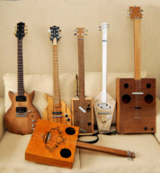 Man creates guitars out of everyday objects and materials, Cannock, Staffordshire, Britain - 18 Jan 2012