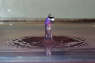 Photographer captures exact moment pellet fired from an airgun speeds through water drop, America - Feb 2012