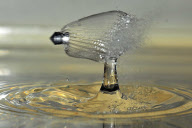 Photographer captures exact moment pellet fired from an airgun speeds through water drop, America - Feb 2012
