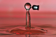 Photographer captures exact moment pellet fired from an airgun speeds through water drop, America - Feb 2012