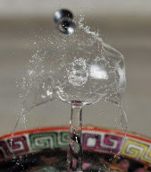 Photographer captures exact moment pellet fired from an airgun speeds through water drop, America - Feb 2012