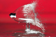 Photographer captures exact moment pellet fired from an airgun speeds through water drop, America - Feb 2012