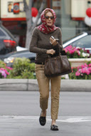 SHARON STONE goes Grace-Kelly-style as she hides her hair with a scarf 