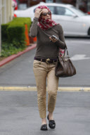 SHARON STONE goes Grace-Kelly-style as she hides her hair with a scarf 