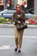 SHARON STONE goes Grace-Kelly-style as she hides her hair with a scarf 