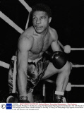Boxer Yolande Pompey On His Way To Losing The Heavyweight Fight Against Archie Moore In The 10th Round At The Haringay Arena.
