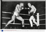 Boxing: Tommy Farr V Lloyd Marshall Carmarthen Wales. 13 Years On From His Glorious Defeat At The Hands Of Joe Louis Tommy Farr (right) Is Still Battling On. On This Occasion He Loses On Points Over 10 Rounds Against Lloyd Marshall. 4th December 1950