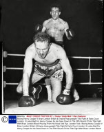 Boxing Henry Cooper V Brian London British & Empire Heavyweight Title Fight At Earls Court London. It Looks Bad For Henry Cooper As He Goes Down In The Fifth Round Of His Title Fight With Brian London Blood Pouring From His Nose And Eye. London Took 