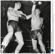 Boxing - Ken Buchanan V Ivan Whiter Lightweight Fight At The National Sporting Club London In 1968. Buchanan Won The Fight After Eight Rounds. Buchanan Swings And Misses While His Opponent Whiter Scores A Hit To The Scot''s Face. Buchanan Quit Boxing