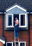Window cleaner filmed leaning into open bedroom window to steal credit card, Telford, Britain - 05 Feb 2012
