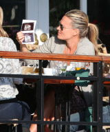 Molly Sims Showing Off Her Sonogram At Lunch