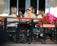 Molly Sims Showing Off Her Sonogram At Lunch