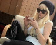 *EXCLUSIVE* Lindsay Lohan does her Time