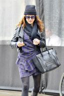 *EXCLUSIVE*  Kate Walsh braves the rain leaving "Little Dom's"