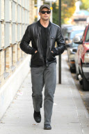 Hugh Jackman Waves for Fans as he Strolls in Manhattan