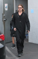 Brad Pitt takes Maddox to get a guitar
