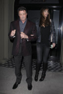 Hollywood hard men Bruce Willis and Sylvester Stallone enjoy dinner with their wives