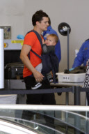 Orlando Bloom and Flynn catch a flight out of LAX