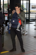 Orlando Bloom and Flynn catch a flight out of LAX