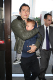 Orlando Bloom and Flynn catch a flight out of LAX