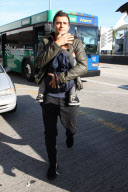 Orlando Bloom and Flynn catch a flight out of LAX