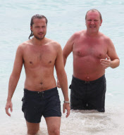 Michael Kors outie on the beach in Saint Barth