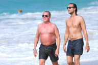 Michael Kors outie on the beach in Saint Barth