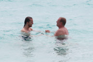 Michael Kors outie on the beach in Saint Barth