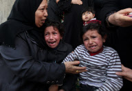 Palestinians Mourn Children
