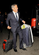 An Unshaven George Clooney Arrives By Amtrak Into Washington D.C.