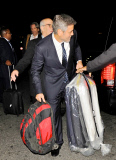An Unshaven George Clooney Arrives By Amtrak Into Washington D.C.