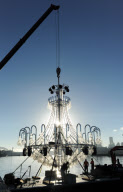 Giant chandelier being moved across Sydney Harbour to floating stage at Royal Botanic Gardens for Handa Opera's production of La Traviata, Sydney, Australia - 16 Mar 2012