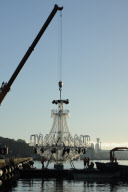 Giant chandelier being moved across Sydney Harbour to floating stage at Royal Botanic Gardens for Handa Opera's production of La Traviata, Sydney, Australia - 16 Mar 2012