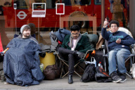Customers queue for new Apple ipad 3 outside the Apple Store in Regents Street, London, Britain - 14 Mar 2012