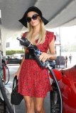Paris and Nicky Hilton stimulate the economy at Alice & Olivia