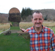"Invisible" figures appear to blend into background in Scottish woods, Scotland - Mar 2012