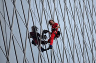 Alain Robert Climbs the Bakrie Tower in Jakarta, Indonesia - 25 Mar 2012