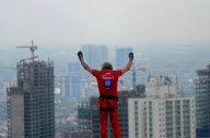 Alain Robert Climbs the Bakrie Tower in Jakarta, Indonesia - 25 Mar 2012