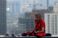 Alain Robert Climbs the Bakrie Tower in Jakarta, Indonesia - 25 Mar 2012