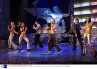 Denise Van Outen with Ricky Martin performing his single "Livin La Vida Loca" at the 1999 Record of the Year Awards.