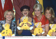S CLUB 7 LAUNCH BBC 'CHILDREN IN NEED' DONATION LINE AT BT TELECOM TOWER IN LONDON, BRITAIN  - NOV 2001