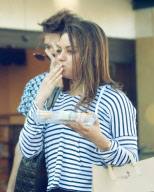 Mila Kunis Has a Mouthful of Spring Rolls
