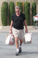 Ryan O'Neal grocery shopping at Vicente Foods in Brentwood and paying for the gas of his Porsche Panamera