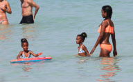 Sean 'P. Diddy' Combs Takes His Twins To The Beach