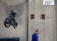 Street art depicts the Queen astride a motorcycle, Windsor Street, London, Britain - 10 Apr 2012