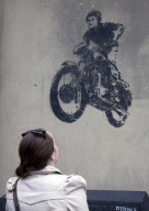 Street art depicts the Queen astride a motorcycle, Windsor Street, London, Britain - 10 Apr 2012